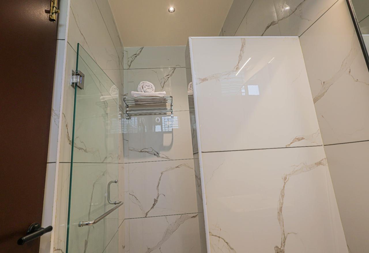 Comfort Suite (1BHK) - Bathroom Shower